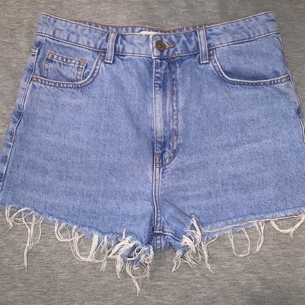 Distressed high-rise light washed Jean shorts